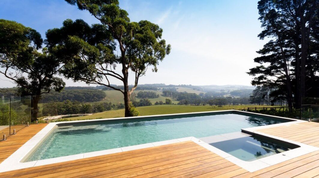 Gordon Ave Pools and Spas_Infinity-lap-pool-built-partially-above-ground above ground fibreglass swimming pool