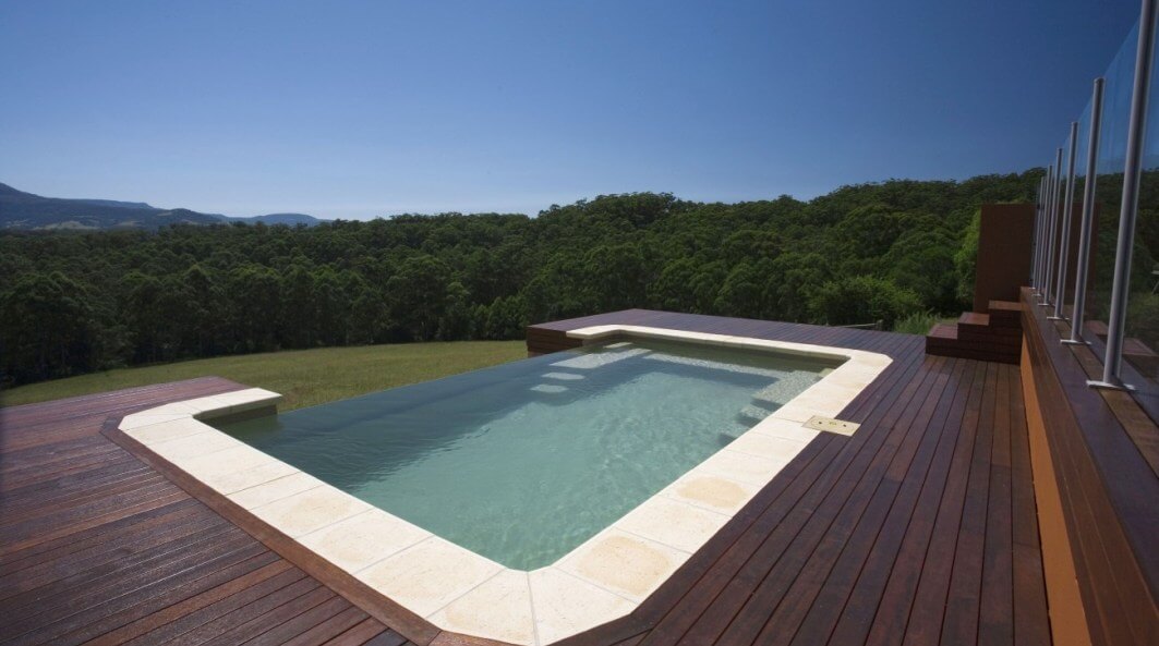 Gordon Ave Pools and Spas_X-Trainer-ol-built-above-ground-with-infinity-edge Infinity edge pool with maxi rib